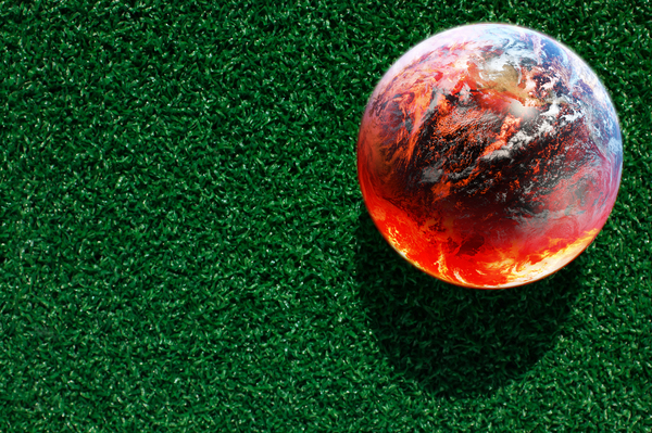 The image shows a concept of the globe warming, highlighting the importance of carbon capture.
